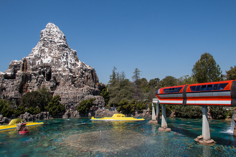 Disneyland Monorail high quality photos near the Matterhorn passing over Nemo Submarine ride to Tomorrowland Station