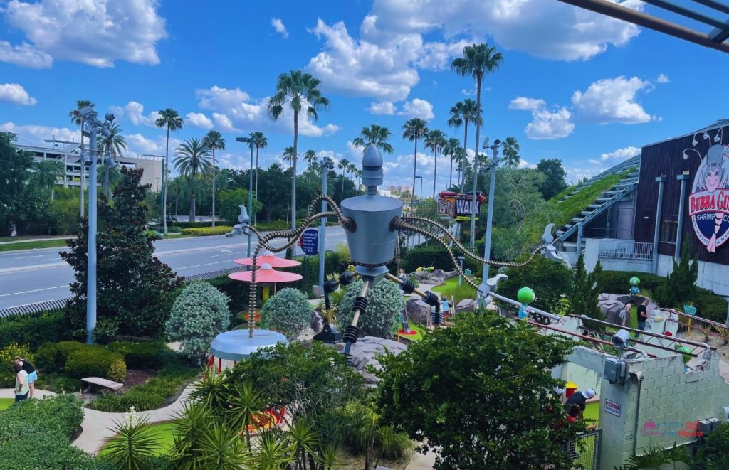Golfing at Universal Orlando Resort next to Parking Sign