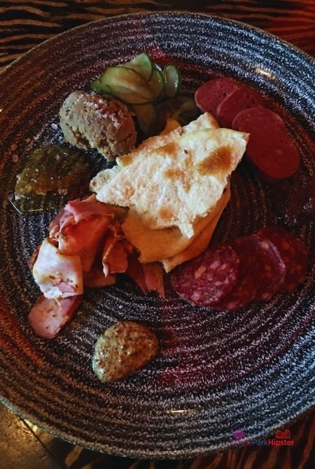 Nomad Lounge in Animal Kingdom Charcuterie Board. Keep reading to learn about the best lounges and bars at Disney World.
