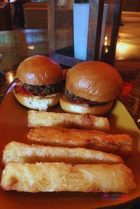 Nomad Lounge in Animal Kingdom Filet Beef Sliders with Fries. Keep reading to learn about the best lounges and bars at Disney World.