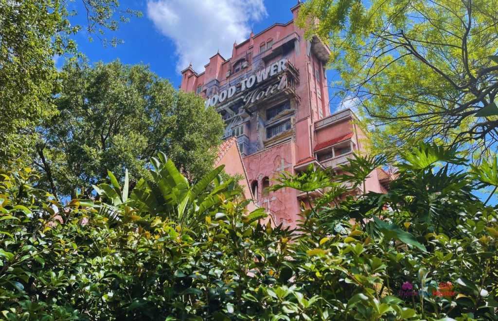 Overgrown palms outside the façade of The Hollywood Tower Hotel, home of The Twilight Zone Tower of Terror at Disney's Hollywood Studios.