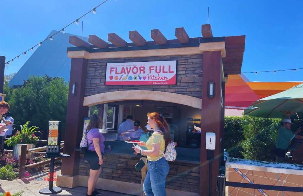 2024 Epcot Flower and Garden Festival Flavor Full Kitchen. Keep reading to learn how to go to Epcot Flower and Garden Festival alone and how to have the perfect solo Disney World trip.