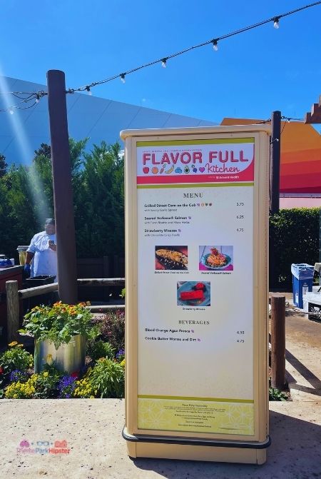 Epcot Flower and Garden Festival Menu Flavor Full Kitchen Men with Grilled Street Corn on the Cob