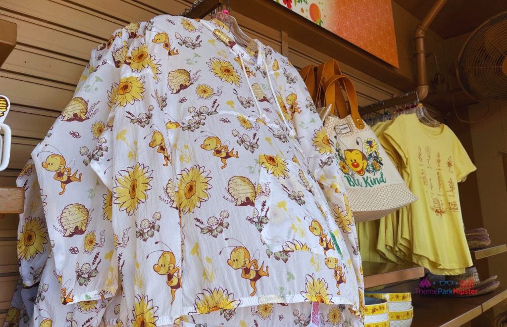Epcot Flower and Garden Festival With Spike the Bee on a Shirt and Bag. Keep reading to know what to wear to Disney World in February and what to pack for Disney World in February!