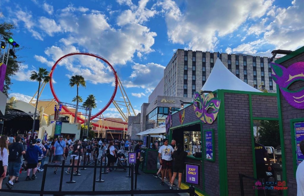 Hollywood Rip Ride Rockit Roller Coaster next to Jimmy Fallon Ride during Mardi Gras at Universal Studios Florida. Keep reading to get the best Universal Studios packing list and what to wear to Universal Orlando Resort.