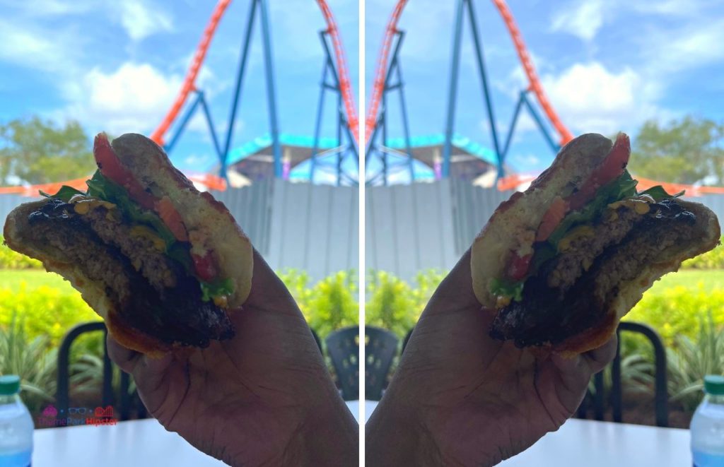 SeaWorld Orlando Burger from Altitude Burgers in front of Icebreaker. Keep reading to learn more about the best SeaWorld Orlando restaurants.