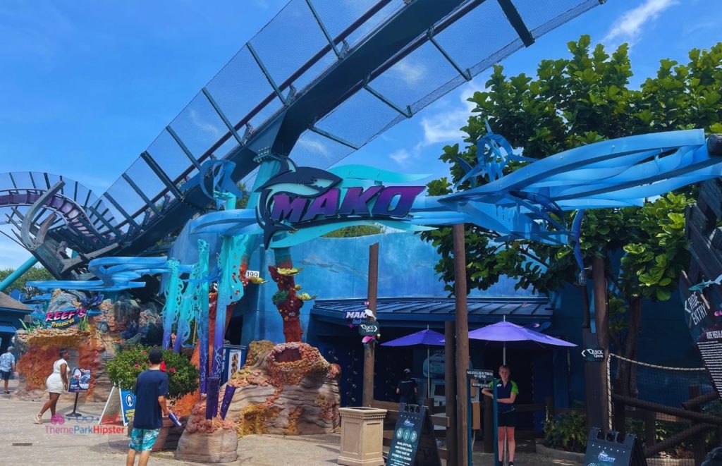 SeaWorld Orlando bright blue Mako roller coaster entrance. Keep reading to learn more about Sharks Underwater Grill at SeaWorld Orlando.