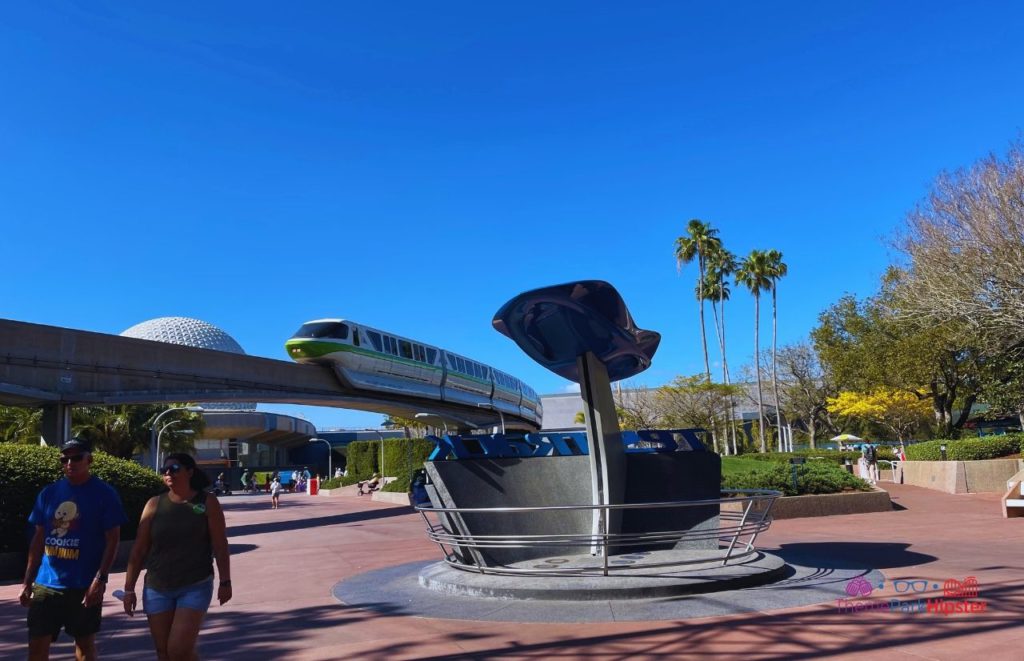 Test Track Epcot Entrance area with monorail and Spaceship Earth. Keeping reading to learn about doing Epcot for adults and Disney for grown-ups.