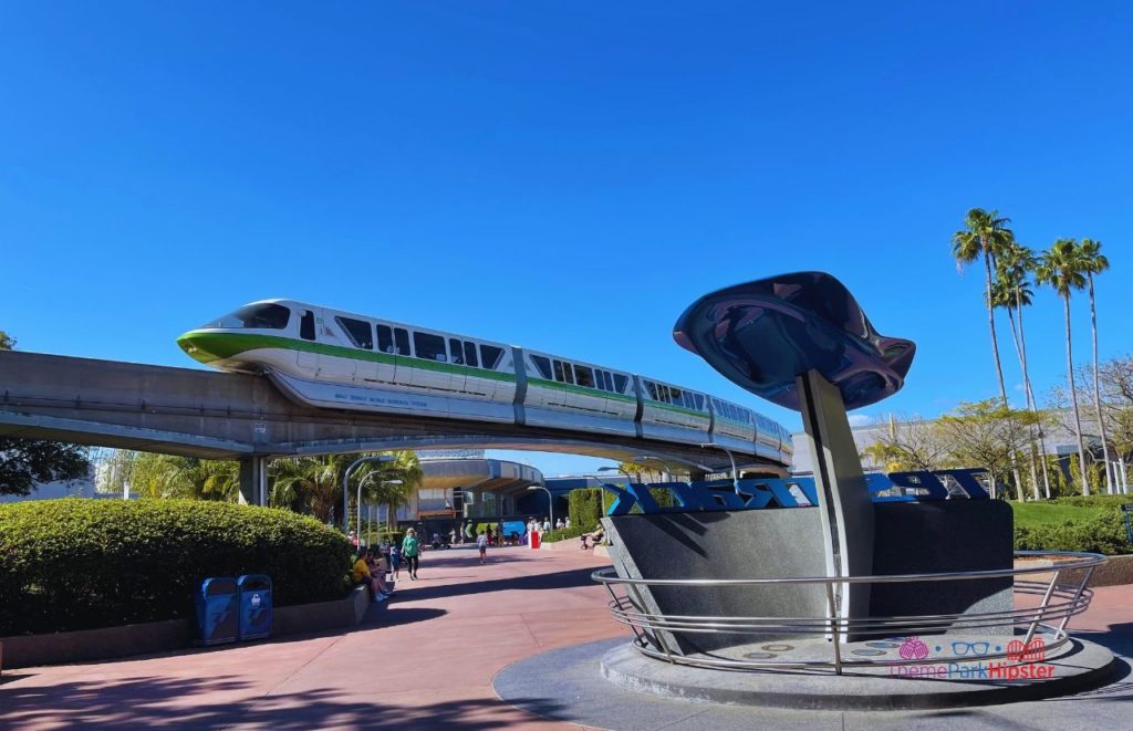 Test Track Epcot Front Area with Monorail driving by. Keep reading to get the best Epcot Food and Wine Festival Tips!