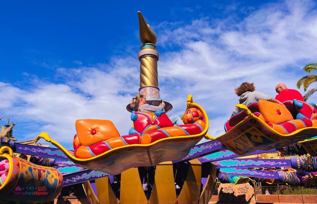 Disney Magic Kingdom Aladdin Magic Carpet Ride in Adventureland. Keep reading to learn where to find cheap Disney World tickets and discounts.