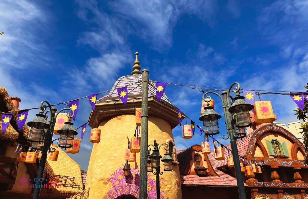 Tangled area of Disney Magic Kingdom Fantasyland Rapunzel Village Restrooms. One of the best bathrooms at Disney World. Keep reading to get the best Disney at Christmastime tips for your trip!