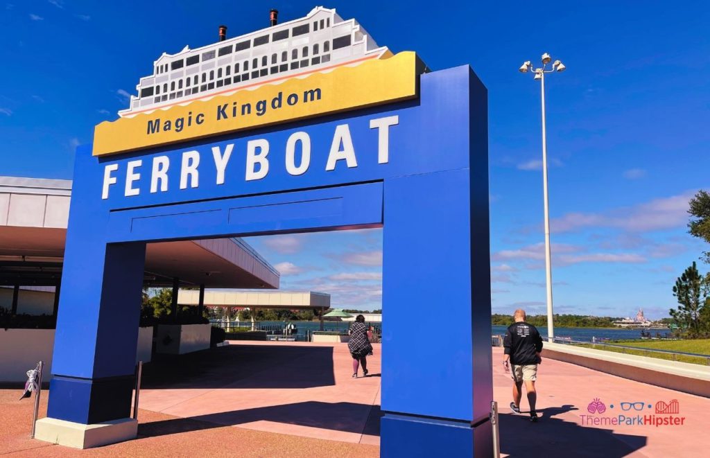 Disney Magic Kingdom Ferry Boat sign with a blue entrance. Keep reading to discover more about the best place to watch Magic Kingdom fireworks.