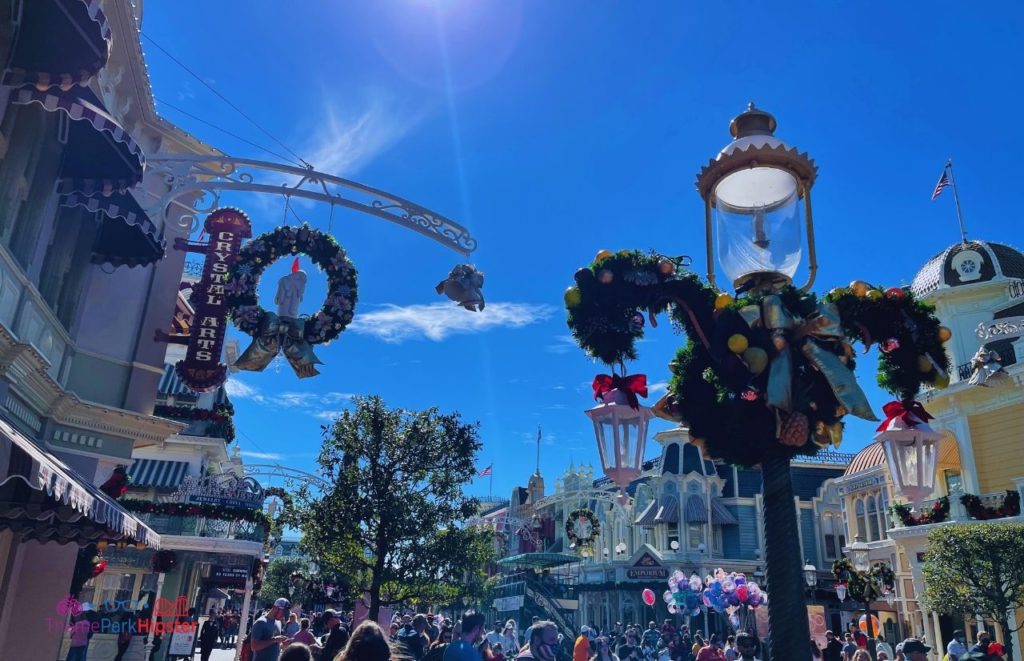 Disney Magic Kingdom Main Street USA on a crowded Christmas Day. Keep reading to learn about the most fun and unique things to do at Disney World.