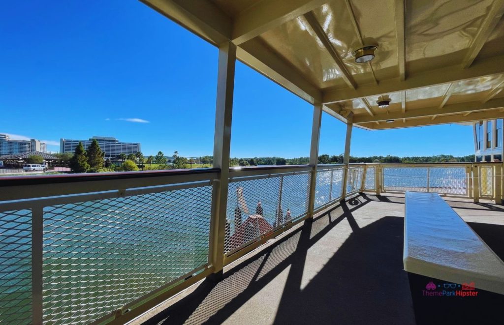 View from the Ferry boat overlooking water with Contemporary Resort at Disney Magic Kingdom. Keep reading to discover more about the best place to watch Magic Kingdom fireworks.