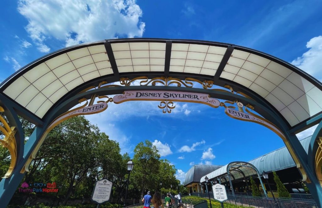 Disney Skyliner Entrance from Epcot. Keep reading to get the full Disney World Skyliner Guide with the Cost, Hours, Tips and more!