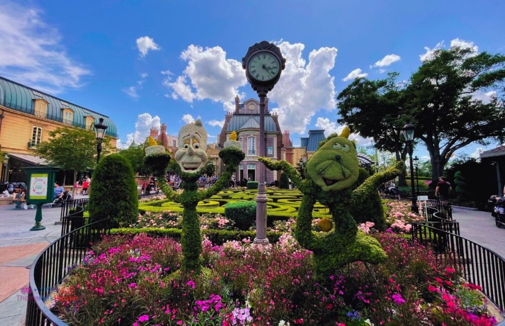 Epcot Flower and Garden Festival in the Epcot France Pavilion Topiary of Beauty and the Beast characters Lumeire and Cogsworth