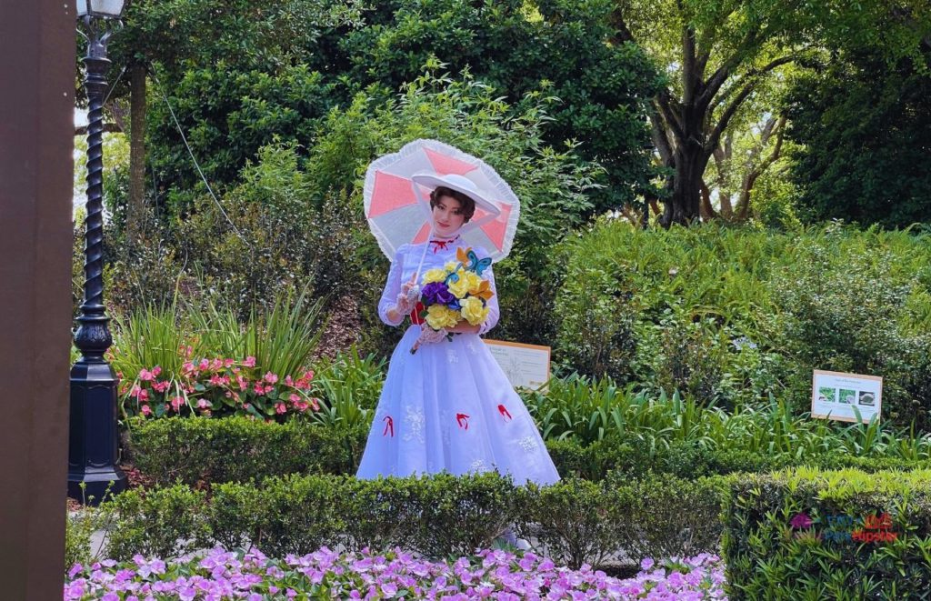 Epcot Flower and Garden Festival Mary Poppins in UK Pavilion. Keep reading to know what to wear to Disney World in April and what to pack for Disney World in April.