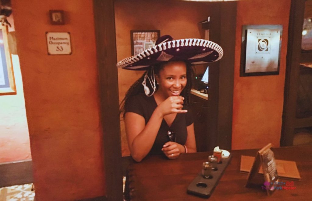 NikkyJ enjoying tequila in Epcot at La Cava Del Tequila in the Mexico Pavilion. One of the best drinks at Epcot for Drinking Around the World.