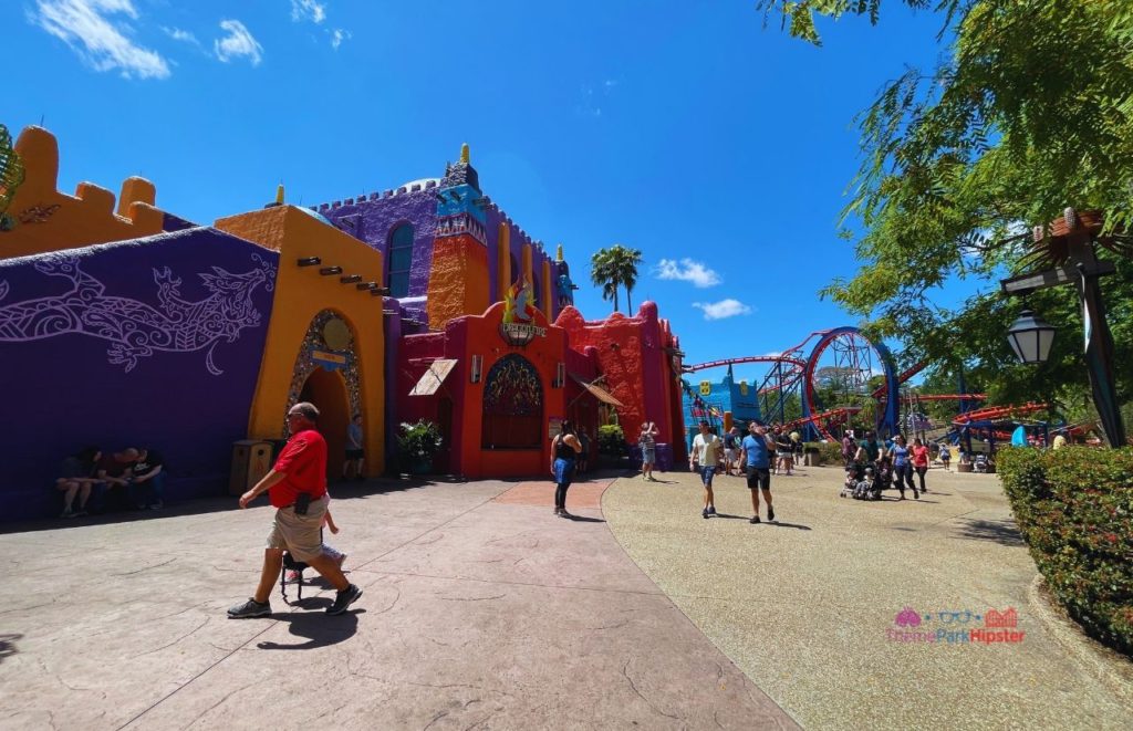 Busch Gardens Tampa Bay dragon fire grill in pantopia with Scorpion Roller Coaster in the background.