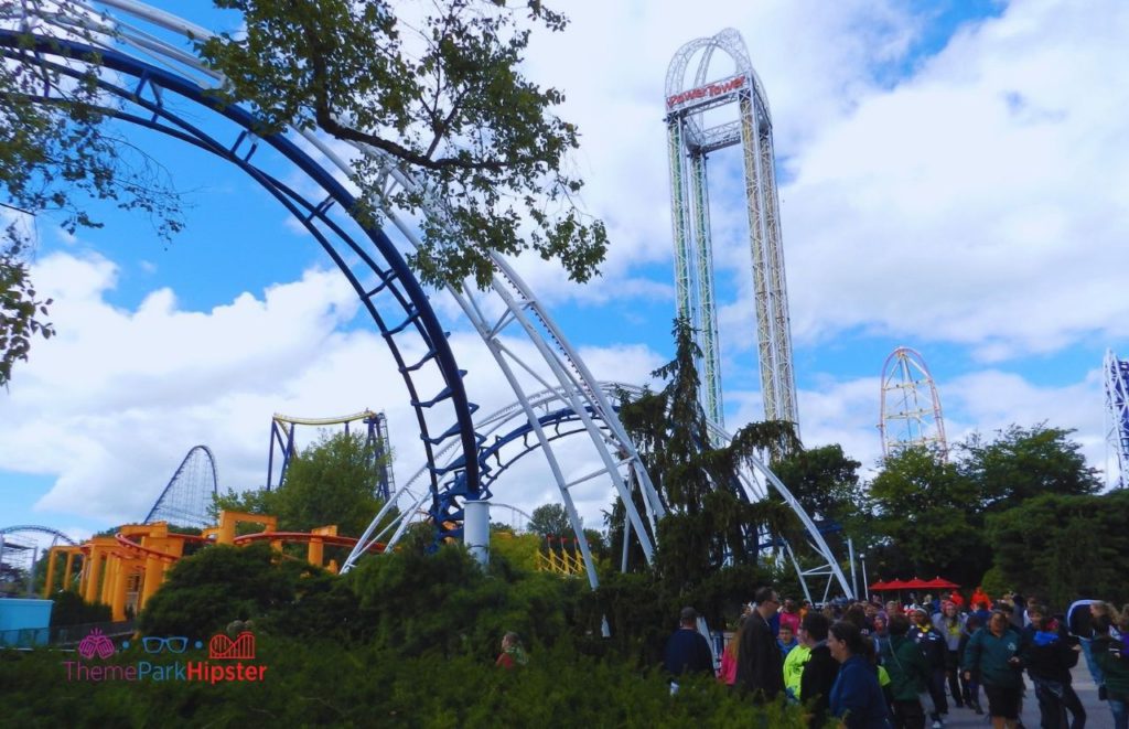 Cedar Point Drop Power Tower next to Corkscrew and Dragon Roller Coaster. Keep reading to see where to find cheap Cedar Point tickets at a discount.