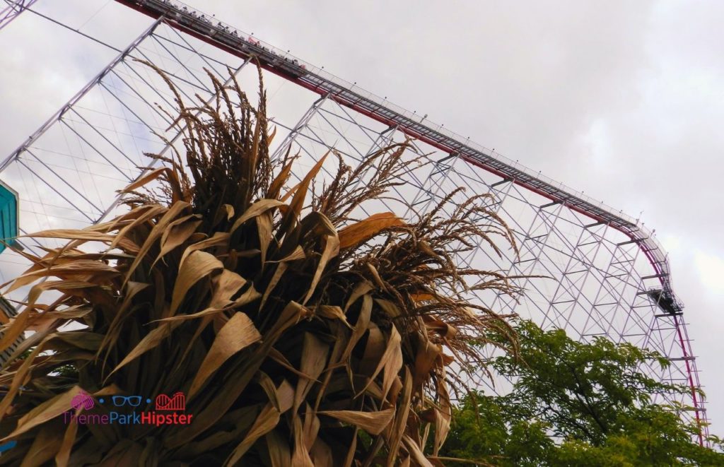 Cedar Point Magnum XL roller coaster going up lift hill on a cloudy day