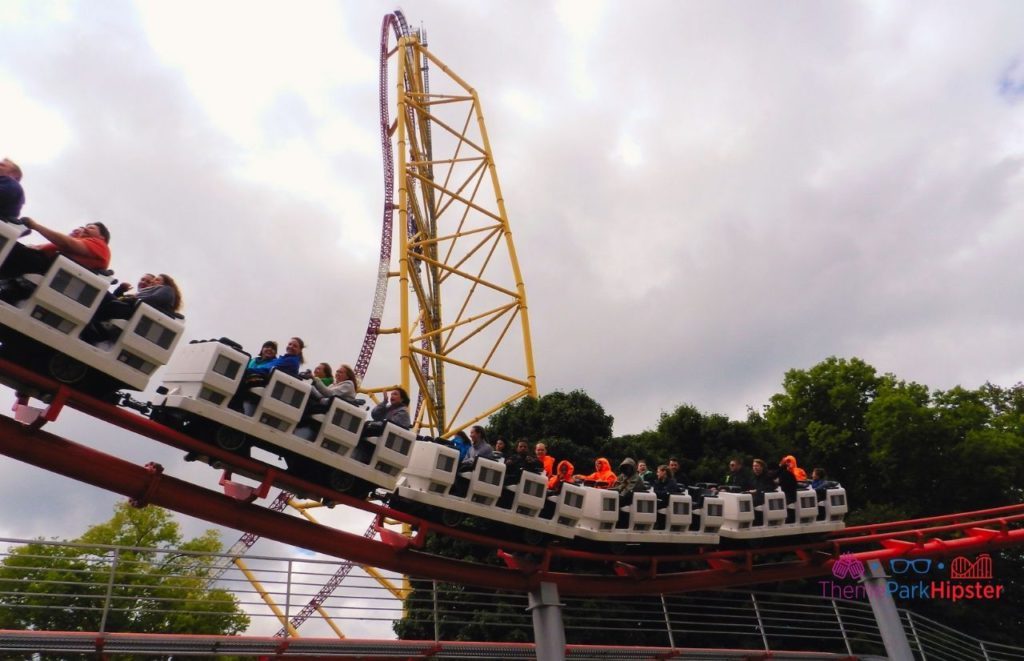 Cedar Point Magnum XL train riding past Top Thrill Dragster. Keep reading to learn about the best Cedar Point roller coasters ranked!