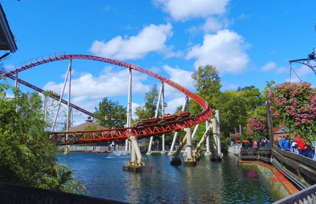 Cedar Point Maverick Roller Coaster Zooming By. Keep reading to know what to pack for an amusement park and have the best theme park packing list.