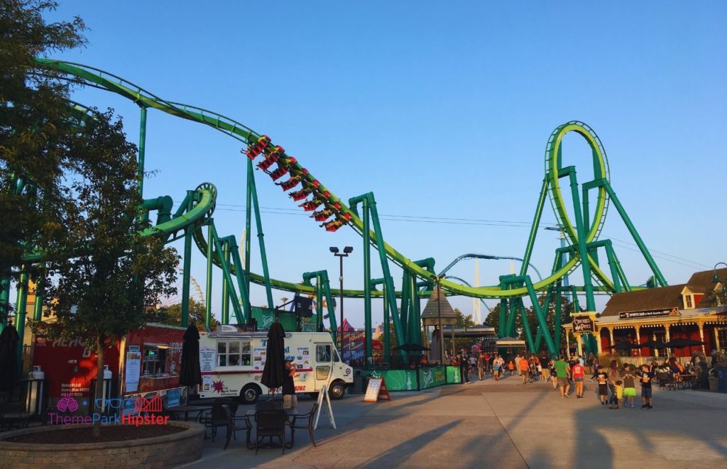 Cedar Point Raptor Roller Coaster behind food trucks and chicken pete. Keep reading for more Cedar Point tips and tricks for beginners.