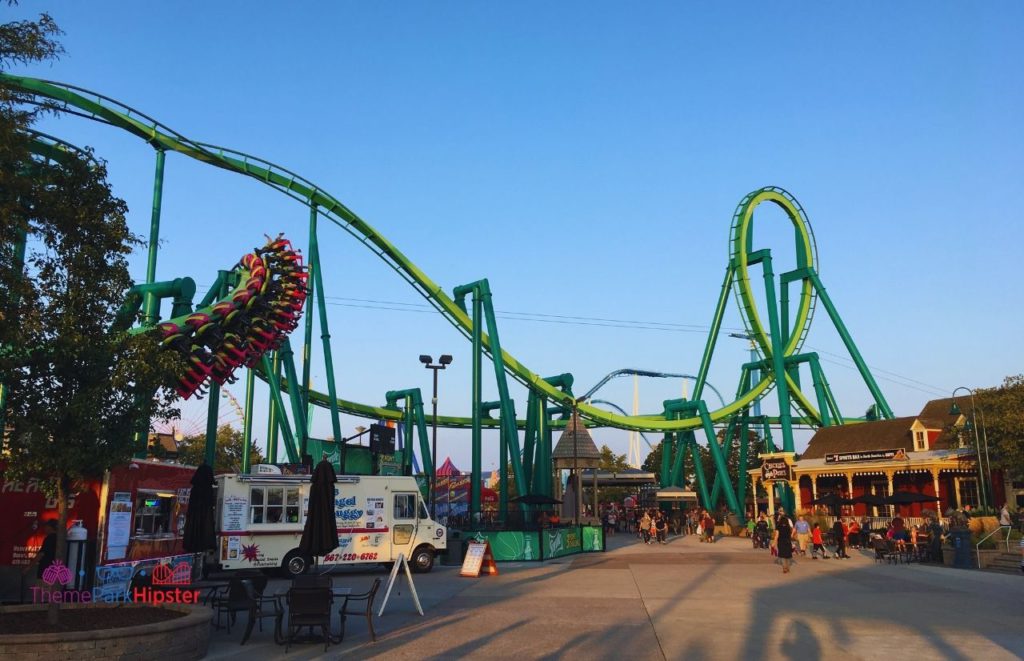 Cedar Point Raptor roller coaster with loop behind Chicken and Petes