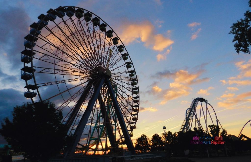 Cedar Point Sunrising Gatekeeper and Ferris Wheel. Keep reading for more Cedar Point tips.