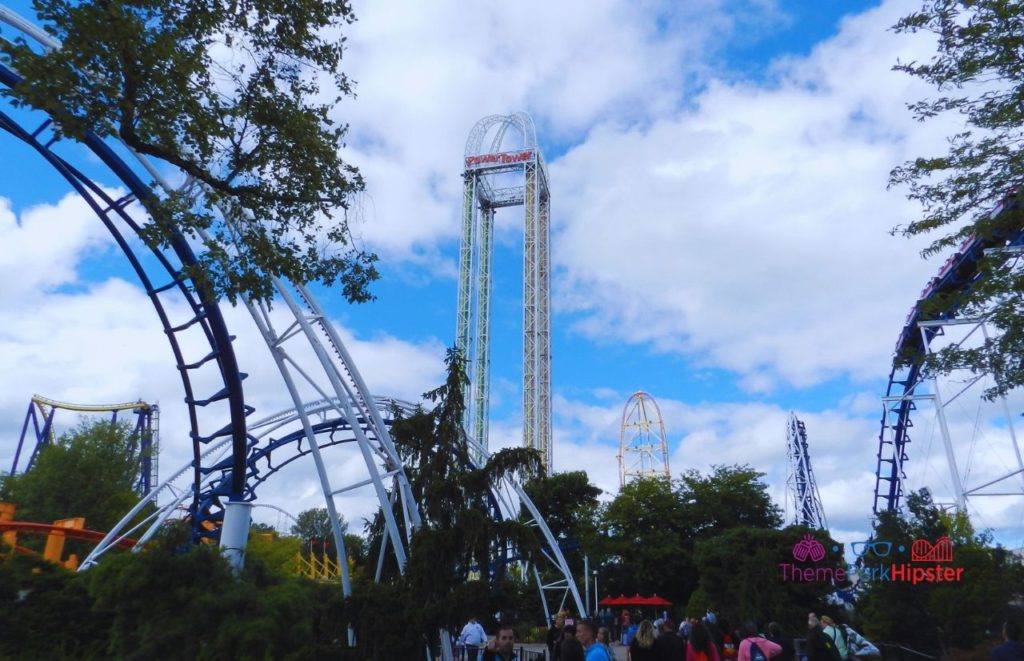 Cedar Point view of roller coasters with Power Tower and Corkscrew. Keep reading to learn about the best hotels near Cedar Point and where to stay in Sandusky, Ohio.