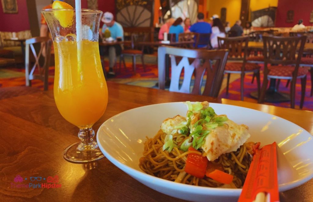 Disney Polynesian Resort Village Back Scratcher Cocktail with Chicken and Noodles. Keep reading to know how to choose the best Disney Deluxe Resorts for your vacation.