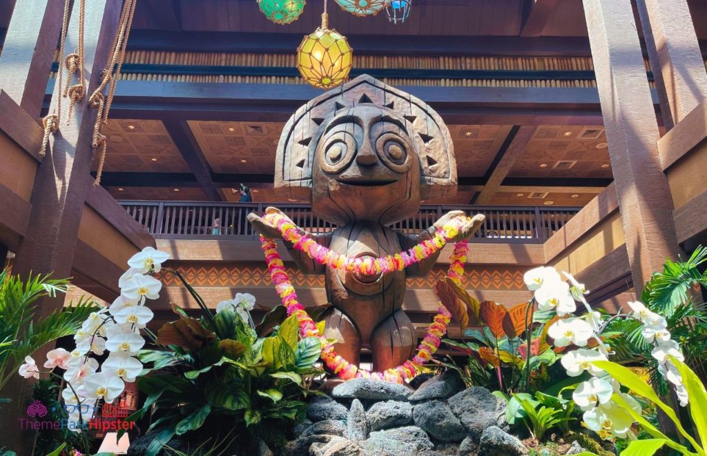 Disney Polynesian Resort Village Lobby Statue at Christmastime.