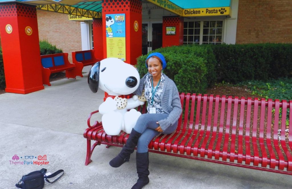 NikkyJ Next to Snoopy at Cedar Point. Keep reading for more Cedar Point Solo Travel Tips!