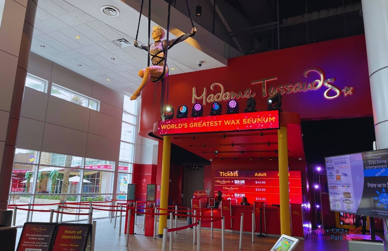 Pink at the entrance of Madame Tussauds Museum in Orlando Icon Park. Keep reading for fun indoor activities Orlando.