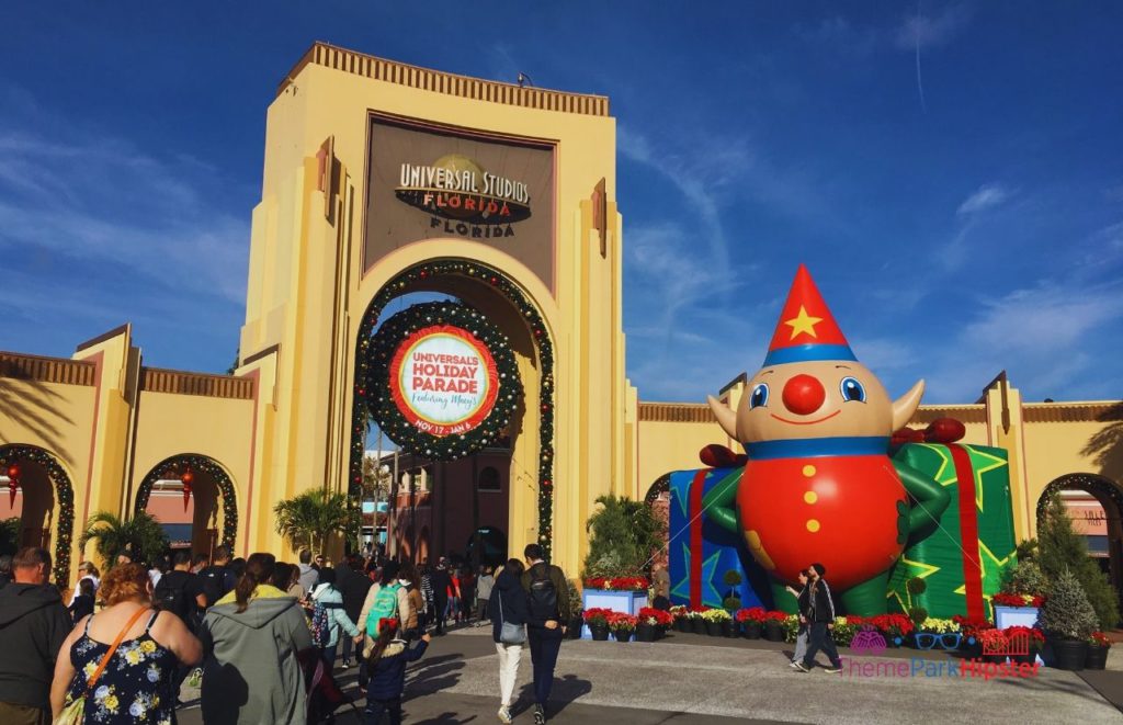 Universal Orlando Resort Christmas decor on the arches of Universal Studios Florida. Keep reading to discover what to pack for Universal Studios Florida.