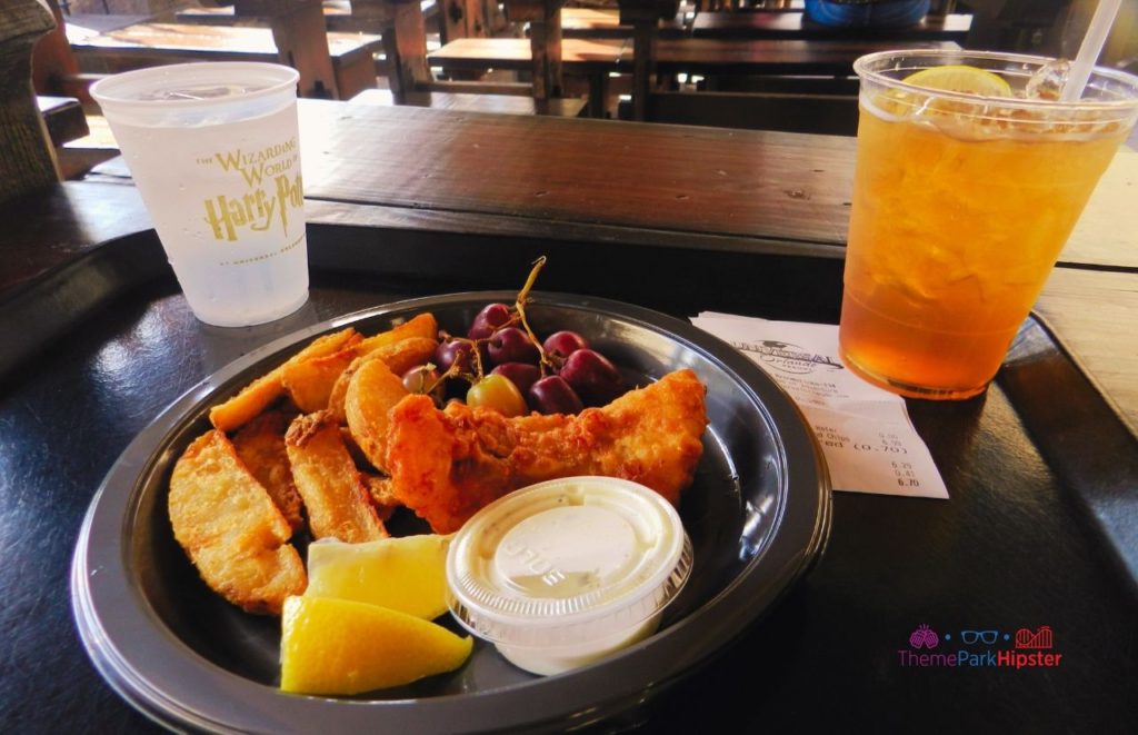 Universal Orlando Resort Fish and Chips at Three Broomsticks in The Wizarding World of Harry Potter Hogsmeade. Keep reading to get the full guide to the Universal Orlando Mobile Order Service.