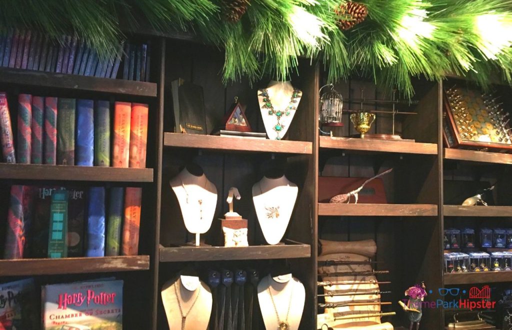 Universal Orlando Resort Harry Potter Store with Books and Ollivander Wands. Keep reading to get the best Harry Potter World souvenirs at Universal.