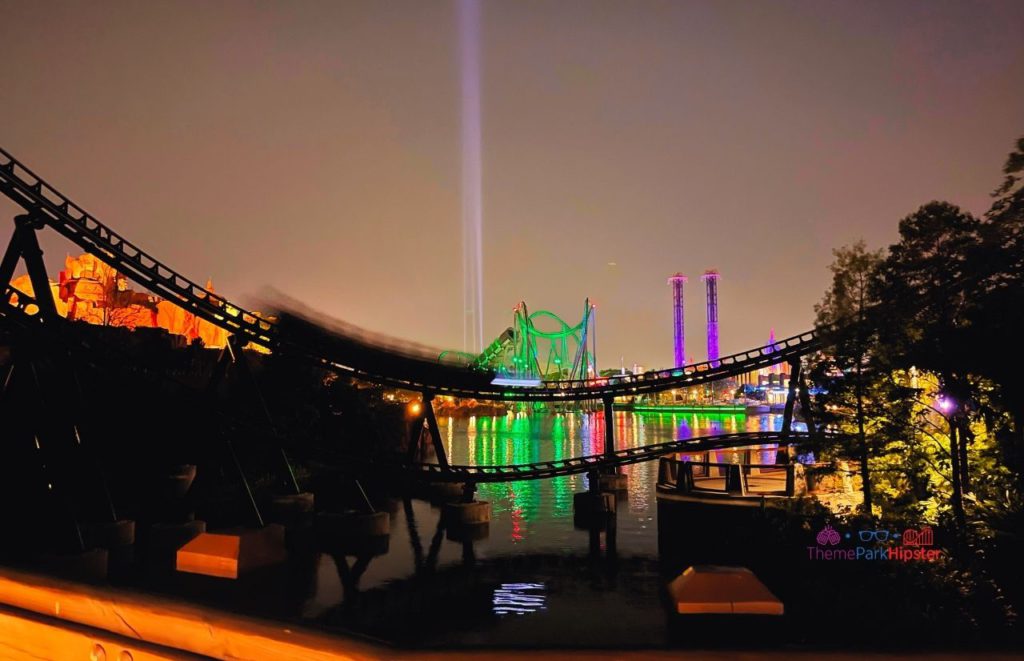 Universal Orlando Resort Jurassic Park Velocicoaster at Night in Islands of Adventure with Hulk and Dr. Doom's Fearfall. Keep reading to learn about Doctor Doom's Fear Fall at Universal.