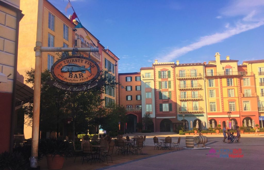 The Thirsty Fish Bar with outdoor seating in front of the plaza at Universal Orlando Resort Loews Portofino Bay Resort. Keep reading to discover more about the best places to stay for Halloween Horror Nights.