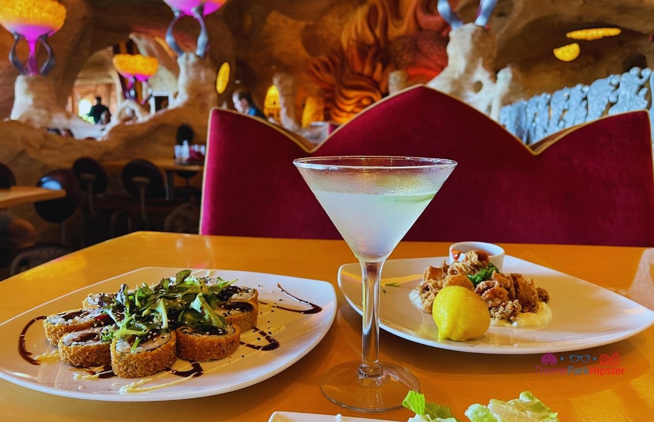 Universal Orlando Resort Mythos Restaurant at Islands of Adventure Calamari with Tempura Sushi and Cucumber Martini. Keep reading about the Universal Orlando Annual Pass Prices and is it worth it?