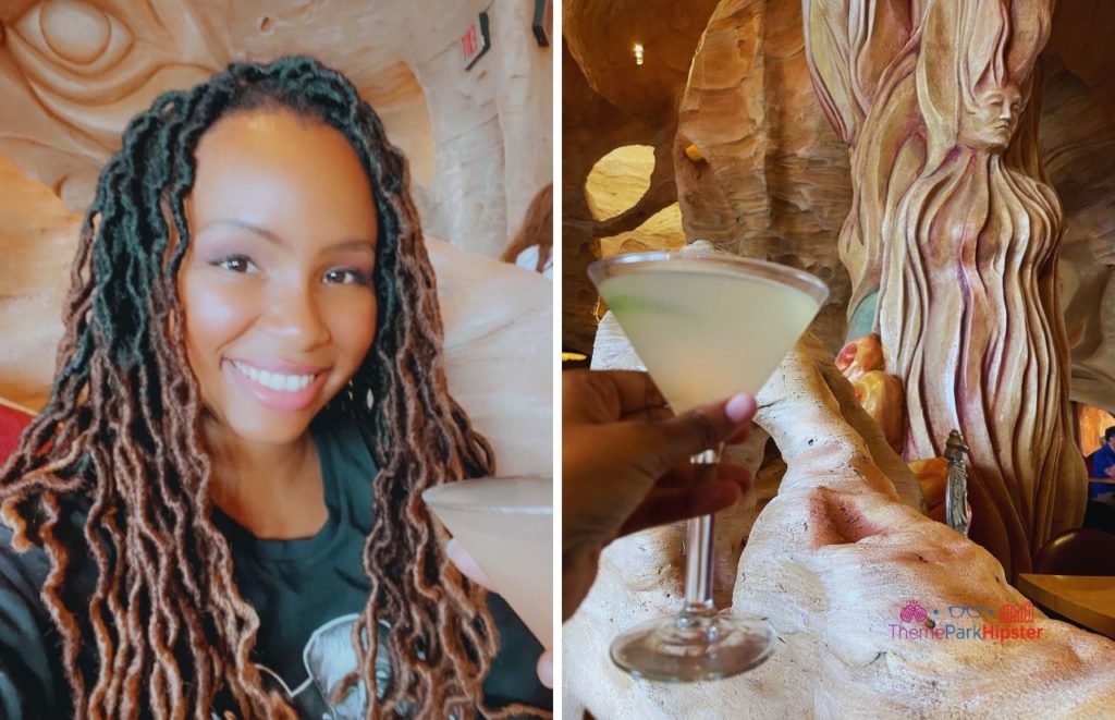 Universal Orlando Resort Mythos Restaurant at Islands of Adventure with NikkyJ holding Cucumber Martini. Keep reading to learn how to have the best Universal Orlando Solo Trip for Travelers going to theme parks alone.