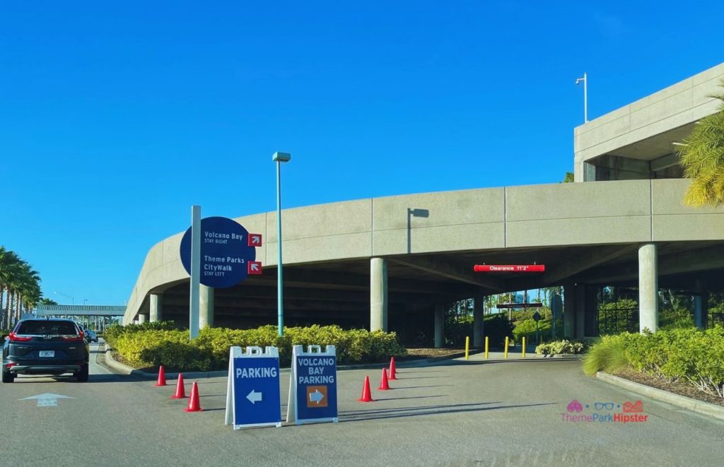 Universal Orlando Resort Parking Garage with Volcano Bay Sign tips and tricks travel guide. 