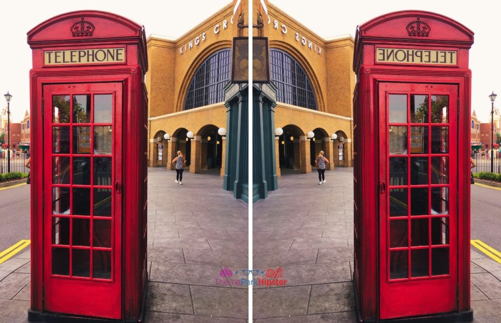 Universal Orlando Resort Red Telephone Booth in front of Kings Cross Station at Harry Potter World Diagon Alley. Your best Harry Potter Itinerary.