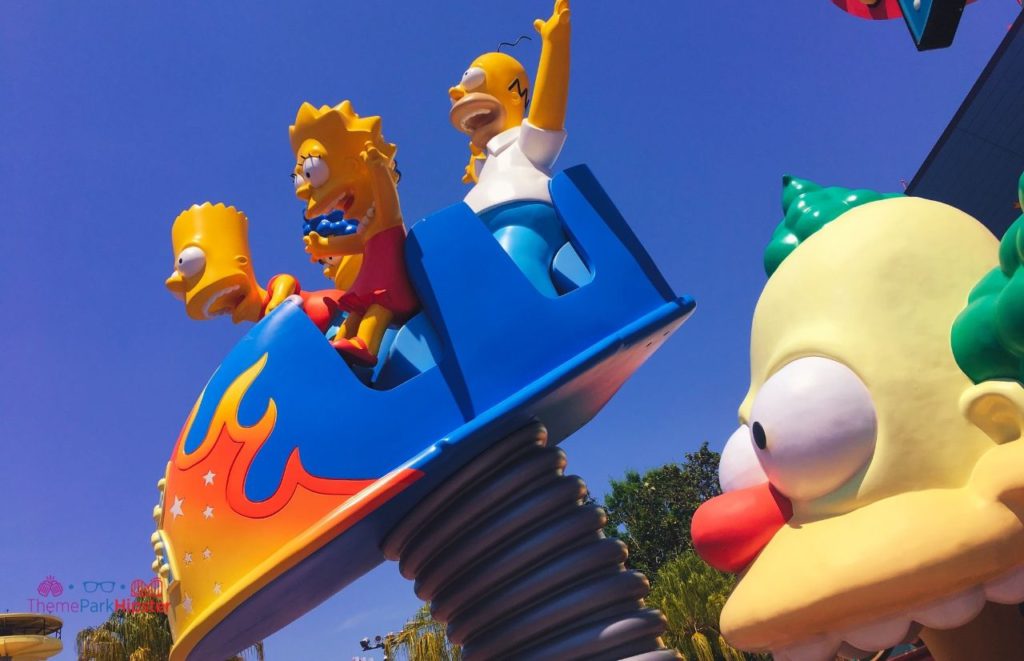 Universal Orlando Resort The Simpsons Ride Entrance with Krusty Clown at Universal Studios. Keep reading for the full guide to the BIG Pink Donut from Universal Lard Lad.