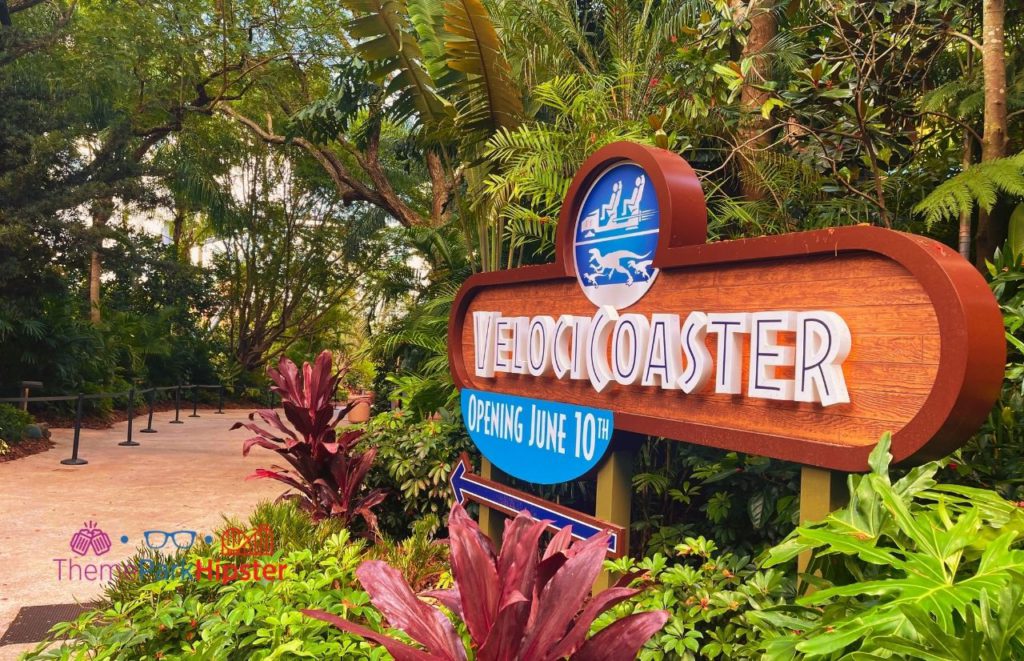 Universal Orlando Resort Velocicoaster Entrance at Islands of Adventure with an opening June 10th sign. Keep reading to discover more about Universal Orlando Coasters: Hulk vs VelociCoaster.