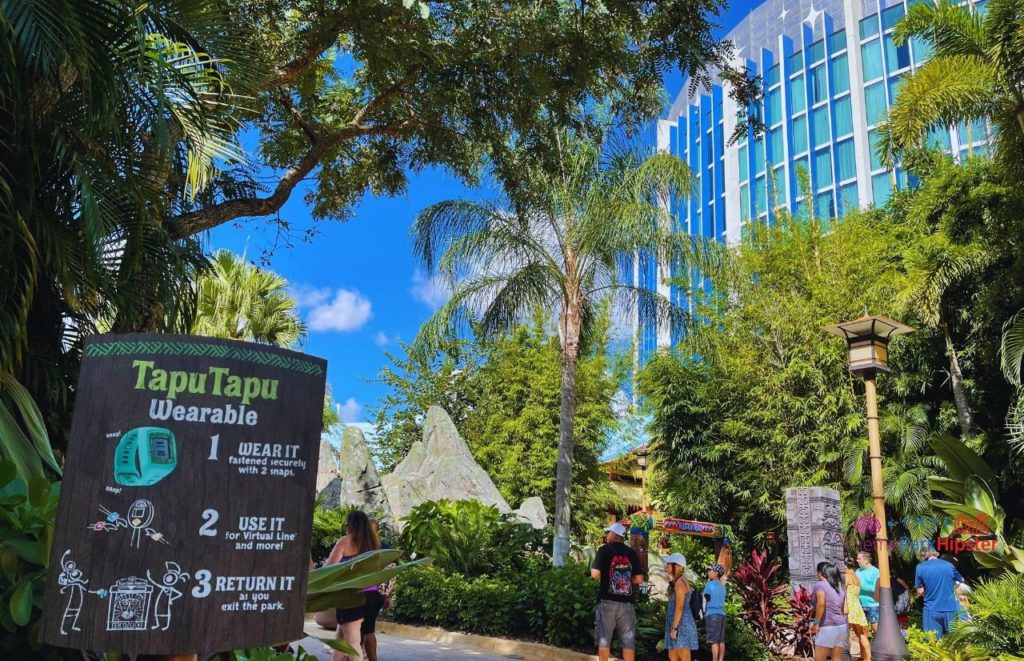 Universal Orlando Resort Volcano Bay Tapu Tapu Sign with Cabana Bay Resort in background. Keep reading to get the best Halloween Horror Nights tips and tricks!