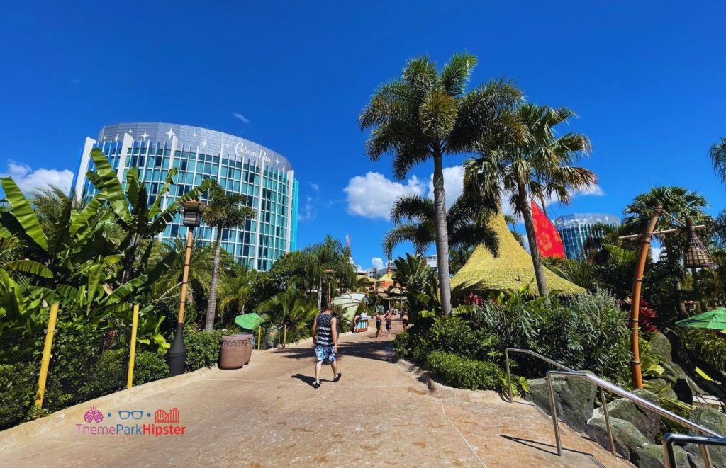 2024 Universal Orlando Resort Volcano Bay with Cabana Bay Beach Resort in the Background. Keep reading to get the best things to do at Universal Orlando for adults.