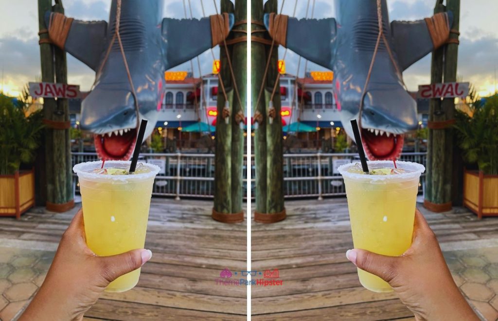 Universal Orlando Resort a margarita at Chez Alcatraz with Jaws Bruce the Shark in background at Universal Studios