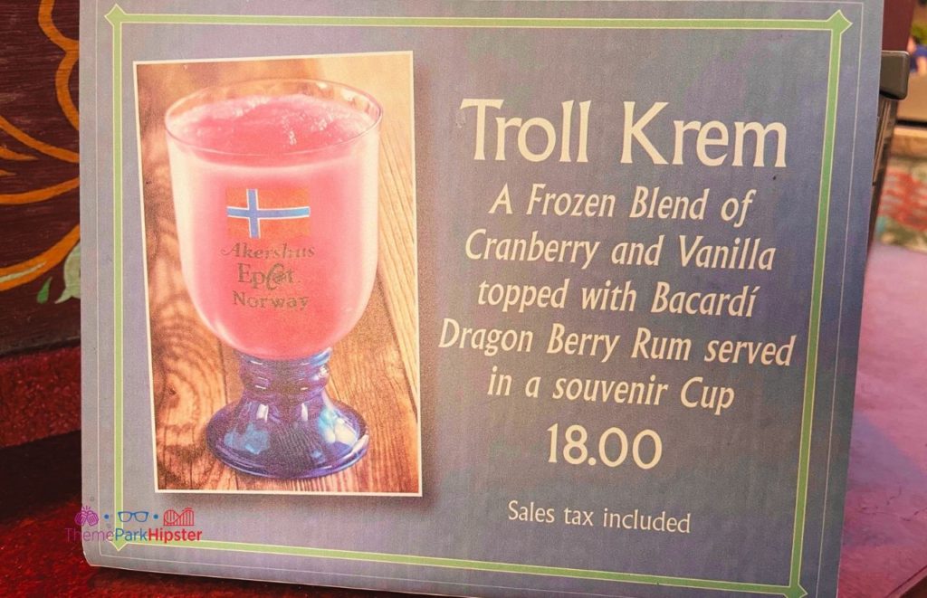 Epcot Food and Wine Festival Norway Troll Krem Cocktail with cranberry vanilla topped with bacardi dragon berry rum. Keep reading to learn about the Best Alcoholic Drinks at Disney World.